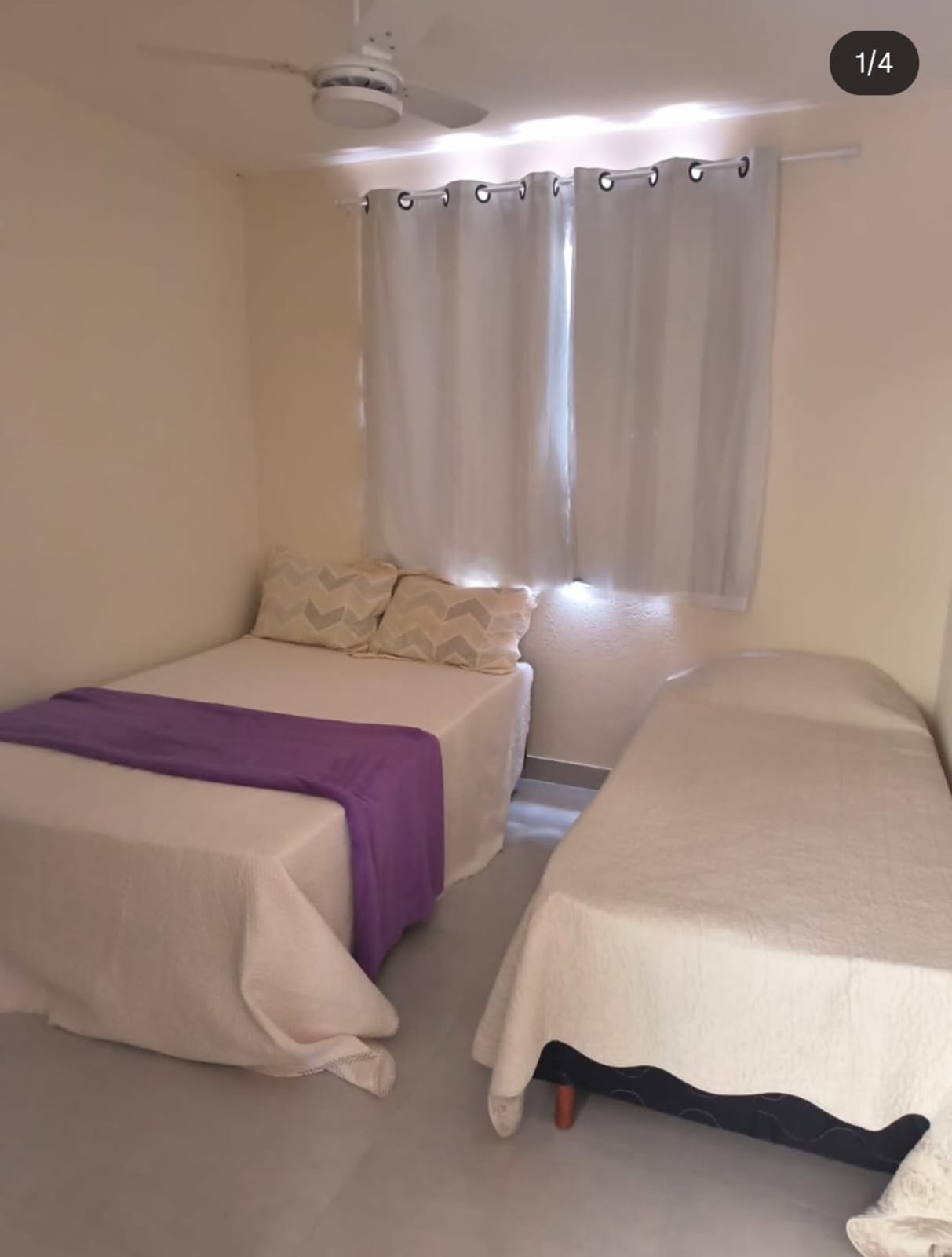 Suíte com cama de casal e cama de solteiro